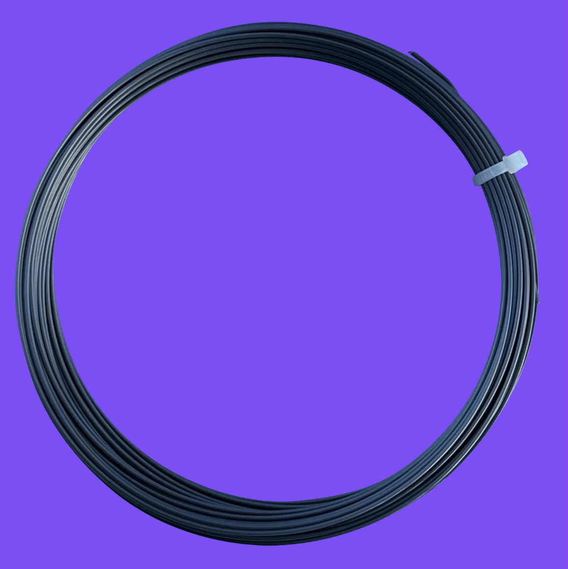 black enso pro tennis strings by toroline on a purple background